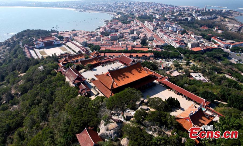 Aerial photo of the Mazu Ancestral Temple complex built on the hillside and by the sea at Meizhou Island, Putian, east China's Fujian Province, Jan. 3, 2022. (Photo: China News Service/Wang Dongming)