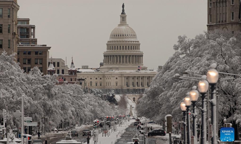 The U.S. Capitol Building is seen after a snowstorm in Washington, D.C., the United States, on Jan. 3, 2022.(Photo: Xinhua)