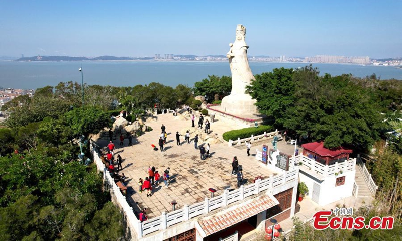 Aerial photo of a 14-meter high Mazu (China's sea goddess) statute erected on a mountain of the Meizhou Island, Putian, east China's Fujian Province, Jan. 3, 2022. (Photo: China News Service/Wang Dongming)