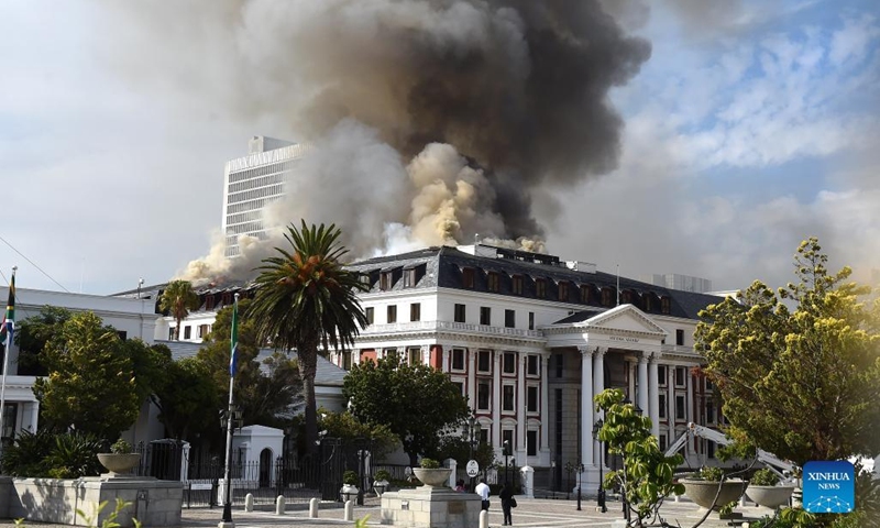 Smoke rises as the fire flares up again on the National Assembly building in Cape Town, South Africa, on Jan. 3, 2022.(Photo: Xinhua)
