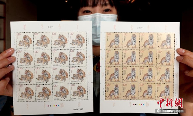 An issuance ceremony of the tiger-patterned stamps is held in the National Museum of China in Beijing, Jan. 5, 2022. (Photo: China News Service/Zhang Yu)