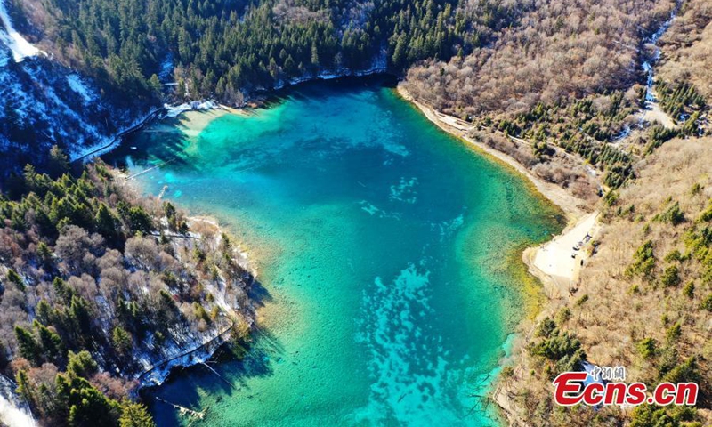 Aerial photo of the Five Flower Lake (Wu Hua Hai) at Jiuzhaigou National Park in the Aba Tibetan and Qiang Autonomous Prefecture, southwest China's Sichuan Province, Jan. 5, 2022. (Photo by An Yuan)