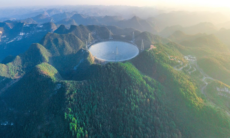 Aerial photo taken on Dec. 19, 2021 shows China's Five-hundred-meter Aperture Spherical Radio Telescope (FAST) under maintenance in southwest China's Guizhou Province.(Photo: Xinhua)