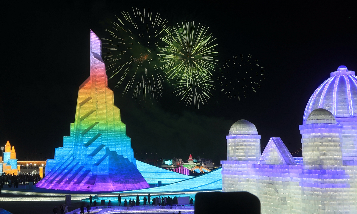 Visitors enjoy a fireworks display at the Harbin Ice & Snow World on December 31, 2021. Photo: VCG