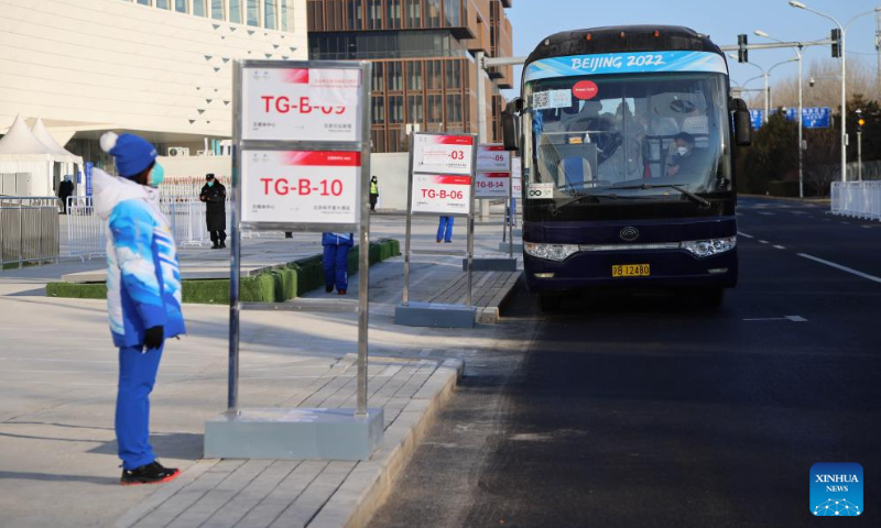 Photo taken on Jan. 10, 2022 shows the TM Bus Load Zone in front of the Main Media Center for the 2022 Olympic and Paralympic Winter Games in Beijing, capital of China. (Xinhua/Xu Zijian)