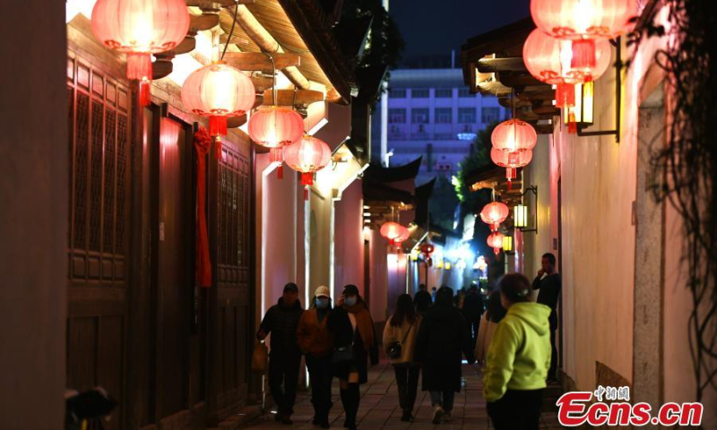 Red lanterns are hung along the blocks Three Lanes and Seven Alleys in Fuzhou, January 10, 2022. (Photo: China News Service/Wang Dongming)
