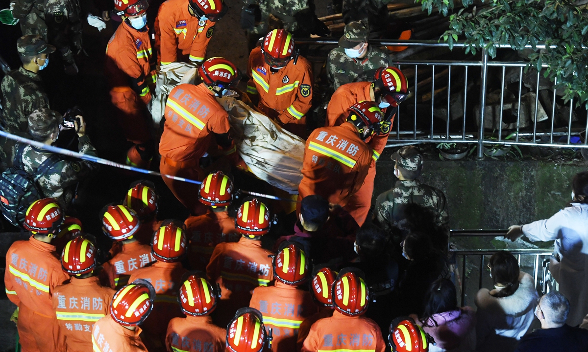 Firefighters rescue one person after a canteen collapsed in an explosion caused by a suspected gas leak in Southwest China's Chongqing Municipality on January 7, 2022. At least nine people are killed. Photo: cnsphoto