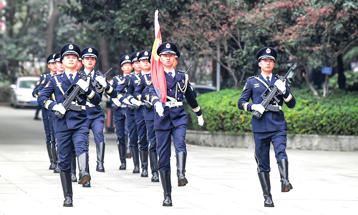 Police officers march during an activity to mark Chinese People's Police Day in Wuhan, Central China's Hubei Province on January 9, 2022. Photo: IC