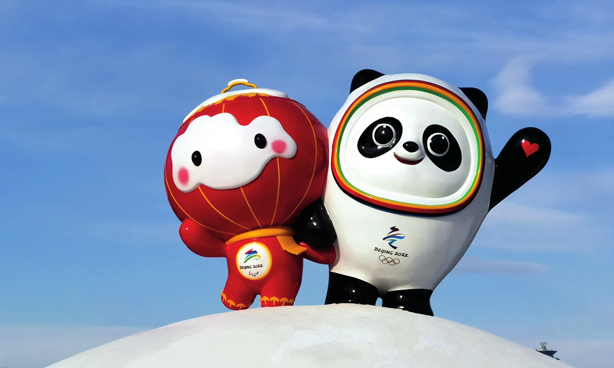 Sculptures of the Beijing 2022's mascots Bing Dwen Dwen, an ice panda, and Shuey Rhon Rhon, a lantern child, are displayed in the city center of Beijing. Photo: VCG