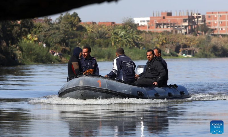 Rescuers search for missing people from a truck that plunged into the Nile River in Giza, Egypt, on Jan. 11, 2022. At least two people were killed and eight others are still missing in Egypt as a truck with 24 passengers plunged into the Nile River near the capital Cairo, the Egyptian public prosecution said in a statement on Tuesday.(Photo: Xinhua)
