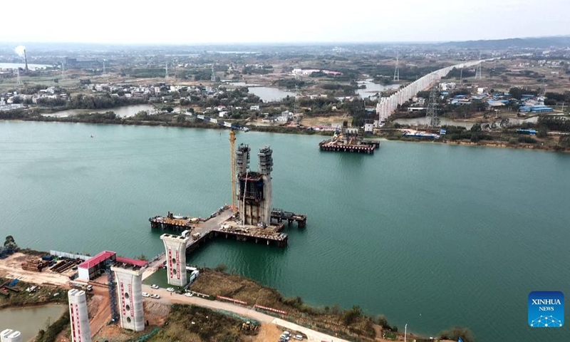 Aerial photo taken on Jan. 11, 2022 shows the construction site of the high-speed railway linking Nanning and Yulin of south China's Guangxi Zhuang Autonomous Region.(Photo: Xinhua)