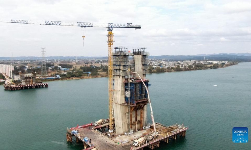 Aerial photo taken on Jan. 11, 2022 shows the construction site of the high-speed railway linking Nanning and Yulin of south China's Guangxi Zhuang Autonomous Region.(Photo: Xinhua)