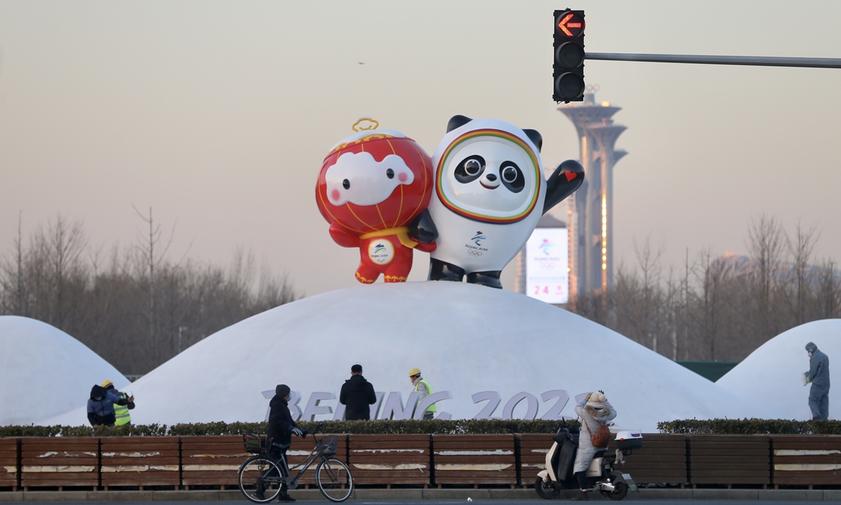 The mascots for the Beijing Winter Olympic and Paralympic Games are seen on a street in Beijing on January 11, 2022. Photo: VCG