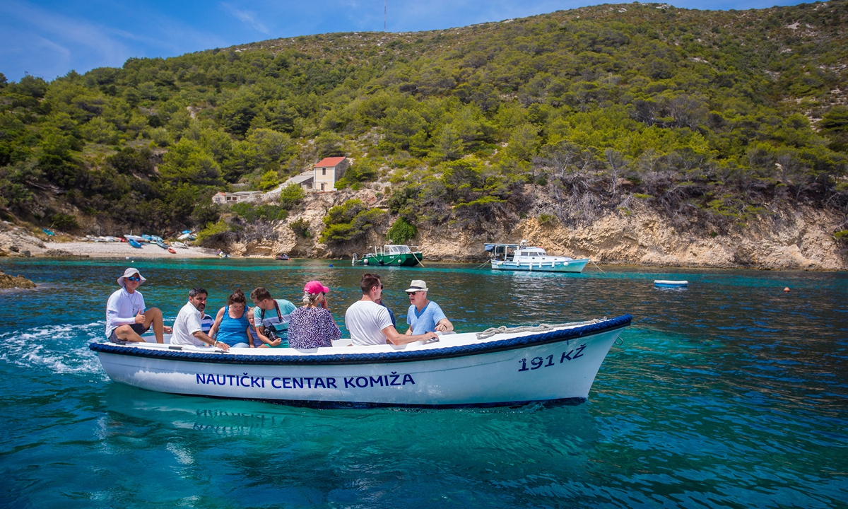 Tourists are visiting the Blue Cave on Bisevo Island, Croatia, on July 19, 2021. Photo: VCG