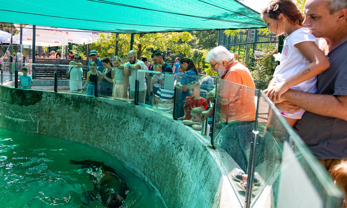 Tourists visit a zoo in Zagreb, Croatia, on August 8, 2021. Photo: VCG
