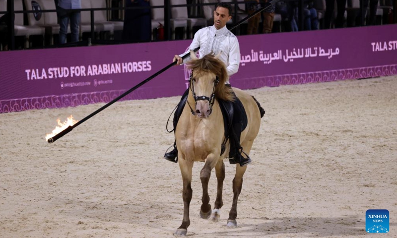 A man riding on a horse performs at the Saudi Arabian Horses Festival in Riyadh, Saudi Arabia on Jan. 13, 2022.Photo:Xinhua