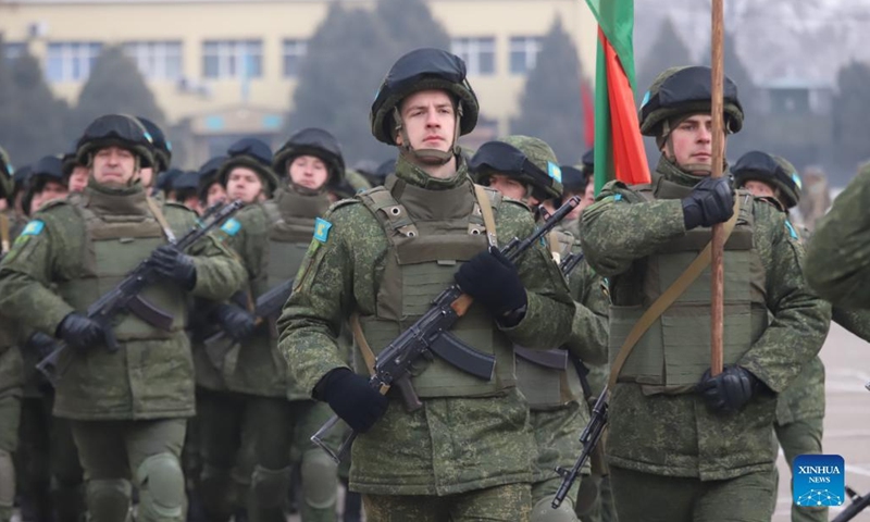 The peacekeeping forces of the Collective Security Treaty Organization (CSTO) march on a departure ceremony in Almaty, Kazakhstan, Jan. 13, 2022. The peacekeeping forces of the CSTO have begun the handover of socially significant facilities to Kazakh law enforcement agencies, the Russian Defense Ministry said Thursday.Photo:Xinhua
