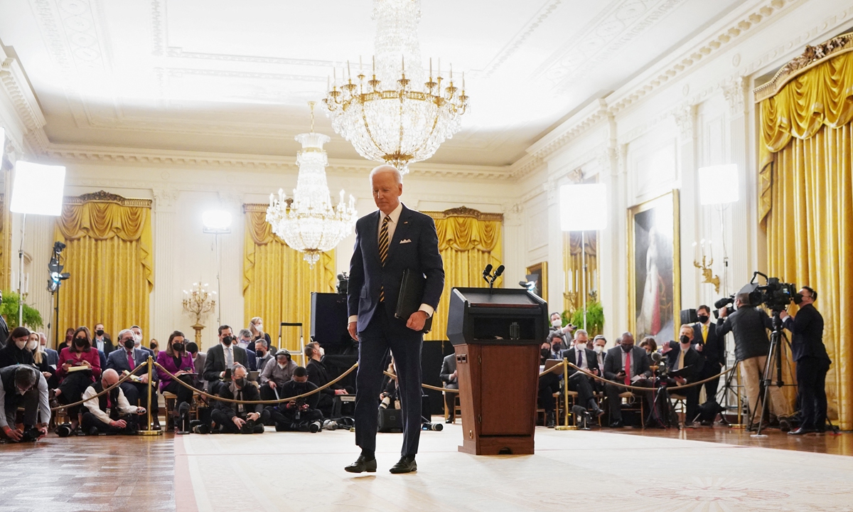 US President Joe Biden leaves after a press conference at the White House in Washington, DC on January 19, 2022, the eve of his first anniversary in office which was marred by a COVID-19 response failure and a tainted global image from the sudden withdrawal from Afghanistan. Photo: AFP