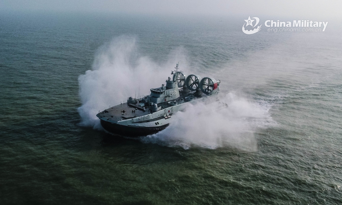 A Landing Craft Air Cushion (LCAC) attached to a naval landing ship flotilla under the PLA Southern Theater Command sails at a high speed to the beach-head during a beach landing training exercise on January 6, 2022.Photo:Xinhua