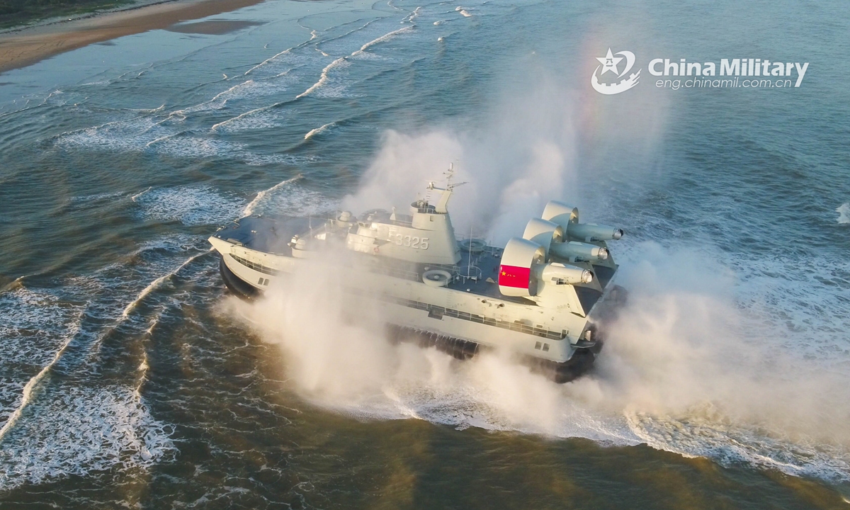 A Landing Craft Air Cushion (LCAC) attached to a naval landing ship flotilla under the PLA Southern Theater Command sails at a high speed to the beach-head during a beach landing training exercise on January 6, 2022.Photo:Xinhua