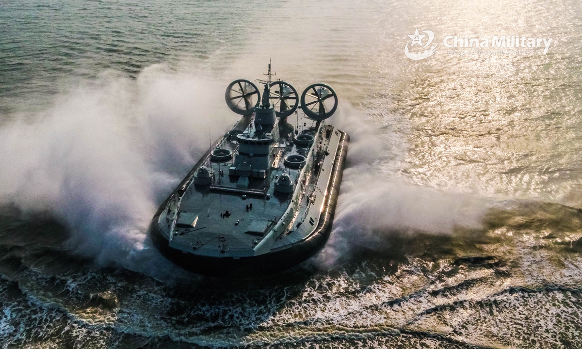 A Landing Craft Air Cushion (LCAC) attached to a naval landing ship flotilla under the PLA Southern Theater Command sails at a high speed to the beach-head during a beach landing training exercise on January 6, 2022.Photo:Xinhua
