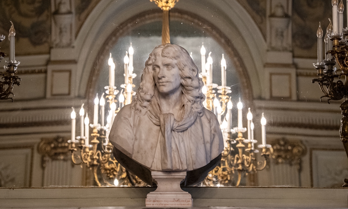  A page from a 1732 bilingual anthology of plays by French playwright Moliere at the Comedie Francaise library in Paris   A bust of French playwright Moliere at the Comedie Francaise national theater, in Paris. Photos: AFP
