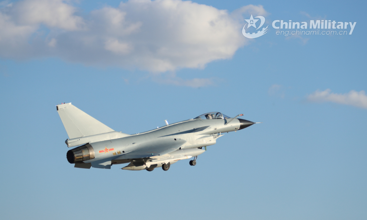 A J-10 fighter jet attached to an aviation brigade with the air force under the PLA Southern Theater Command keeps climbing up during a day-and-night flight training exercise on January 5, 2022. (eng.chinamil.com.cn/Photo by Huang Rongkai) 