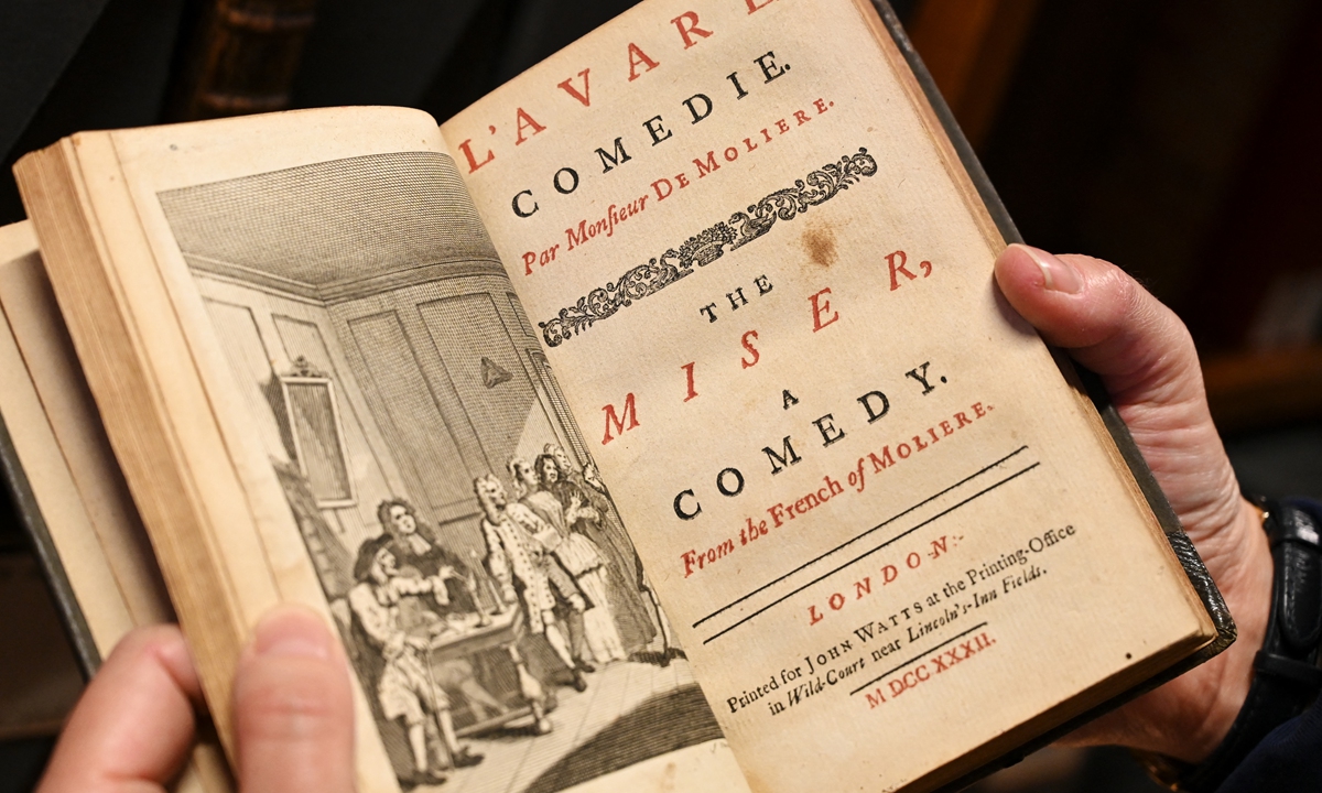  A page from a 1732 bilingual anthology of plays by French playwright Moliere at the Comedie Francaise library in Paris   A bust of French playwright Moliere at the Comedie Francaise national theater, in Paris. Photos: AFP