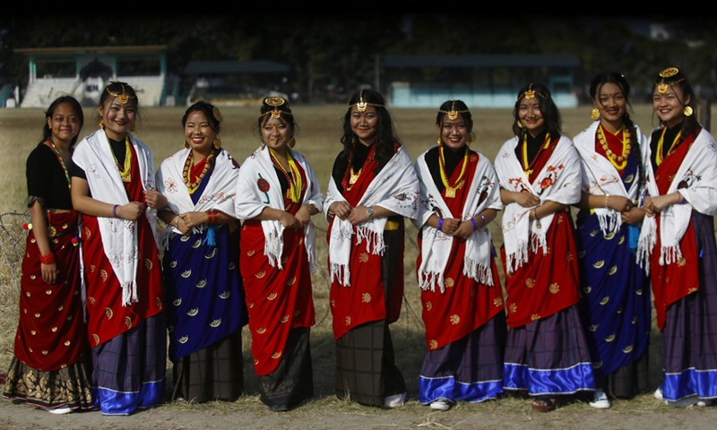 Nepalese girls in traditional attire are seen in celebrations of Maghe Sankranti festival to mark the beginning of the warmer season in Kathmandu, Nepal, on Jan. 15, 2022.Photo:Xinhua