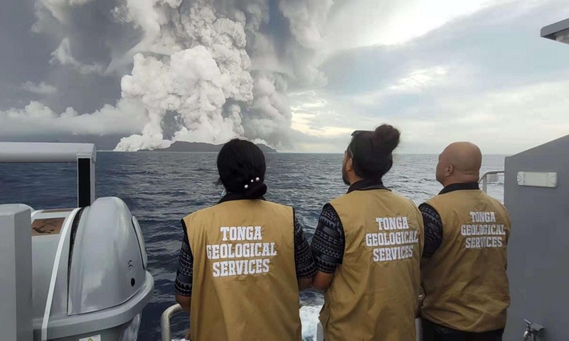Tongan geologists aboard a ship watch the eruption of Hunga Tonga-Hunga Ha'apai volcano in Tonga, Jan. 15, 2022. (Photo provided by Tonga Geological Services of the Government of Tonga.)