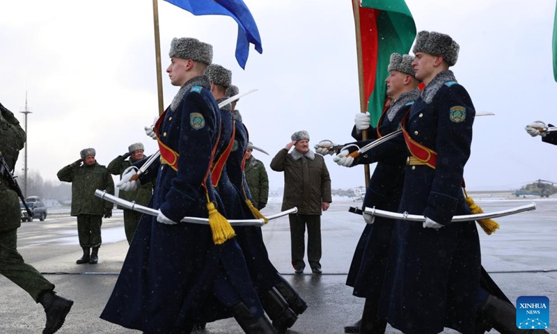 Belarusian President Alexander Lukashenko (C) inspects the Belarusian servicemen at a military airfield in Minsk, Belarus, on Jan. 15, 2022.Photo:Xinhua