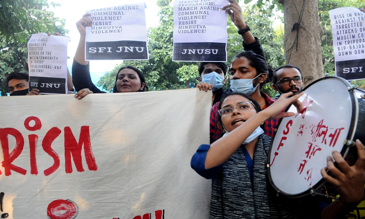 NEW DELHI, INDIA - NOVEMBER 01: Indian student wing of Jawaharlal Nehru University (JNU) shout slogans during the protest against recent incidents of anti-Muslim violence in India's north-eastern state of Tripura on November. 01, 2021 in New Delhi, India. Imtiyaz Khan / Anadolu Agency
Imtiyaz Khan / ANADOLU AGENCY / Anadolu Agency via AFP