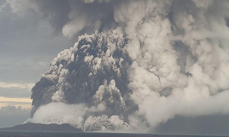 Photo taken on Jan.14, 2022 shows the eruption of Hunga Tonga-Hunga Ha'apai volcano in Tonga.(Photo Tonga Geological Services of the Government of Tonga/Xinhua)