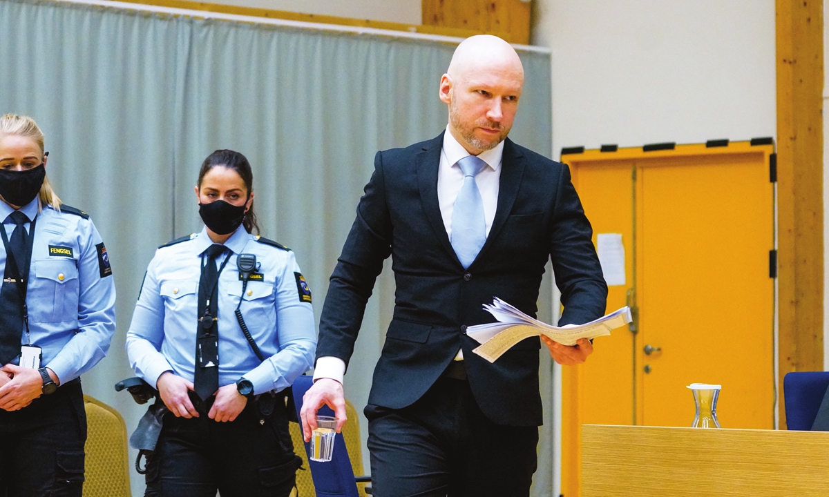 The mass murderer Anders Behring Breivik arrives on the second day of the trial where he is requesting release on parole at a makeshift courtroom in Skien prison, Norwegian on January 19, 2022. Seventy-seven people lost their lives in the attacks that took place in Oslo and Utoya on July 22, 2011. Photo: AFP
