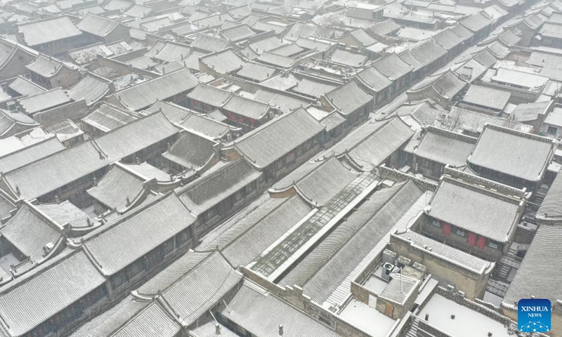 Aerial photo taken on Jan. 21, 2022 shows the snow-covered Pingyao Ancient Town in Jinzhong City, north China's Shanxi Province.Photo:Xinhua