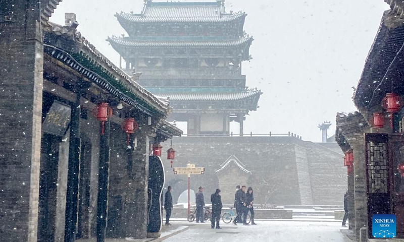 Photo taken on Jan. 21, 2022 shows the snow scenery of Pingyao Ancient Town in Jinzhong City, north China's Shanxi Province.Photo:Xinhua