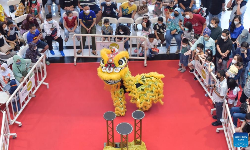 Artists perform a lion dance to celebrate the upcoming Chinese Lunar New Year in South Tangerang, Indonesia, Jan. 22, 2022.Photo:Xinhua