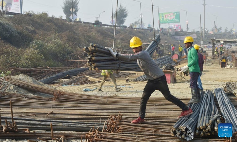 Workers build an expressway which bypasses Dhaka, capital of Bangladesh, Jan. 4, 2022.Photo:Xinhua