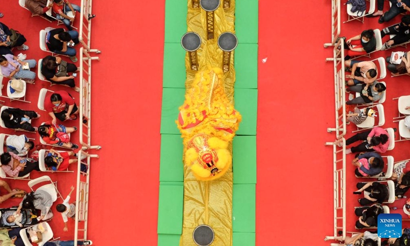 Artists perform a lion dance to celebrate the upcoming Chinese Lunar New Year in South Tangerang, Indonesia, Jan. 22, 2022.Photo:Xinhua