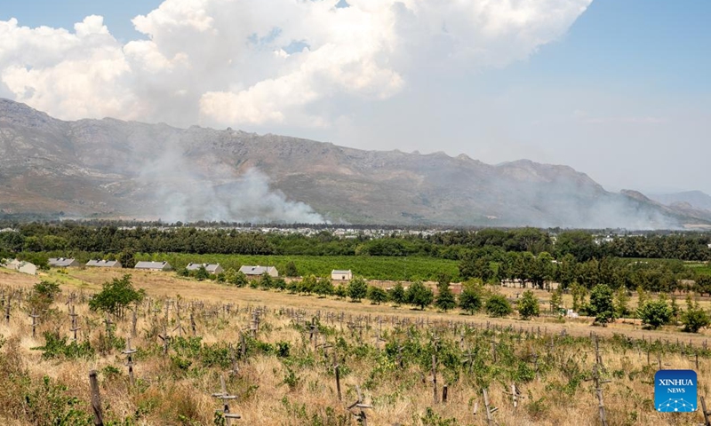 Smoke rises over Paarl, Western Cape Province, South Africa, on Jan. 23, 2022.Photo:Xinhua