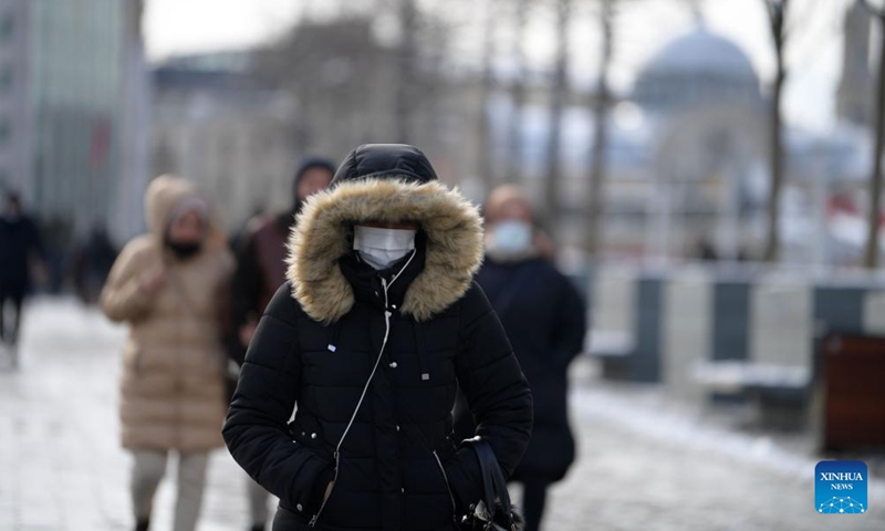 People walk in Taksim Square in Istanbul, Turkey, on Jan. 23, 2022.Photo:Xinhua