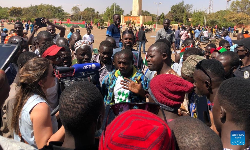 Photo taken on Jan. 25, 2022 with a cellphone shows demonstrators gathering at Place de la Nation in support of the army in Ouagadougou, Burkina Faso. Burkina Faso soldiers said Monday on national television that they had seized power and put an end to the functions of President Roch Kabore. The Patriotic Movement for Safeguard and Restoration (MPSR) took power, led by Lieutenant-Colonel Paul-Henri Sandaogo Damiba. (Photo by Jean-Paul Ouedraogo/Xinhua)