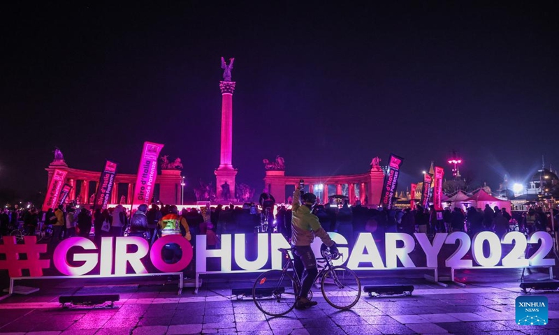 A cyclist is seen during a promotional event of Giro d'Italia 2022 bike race held on Heroes Square in Budapest, Hungary on Jan. 26, 2022. The race will start on May 6. (Photo by Csaba Domotor/Xinhua)