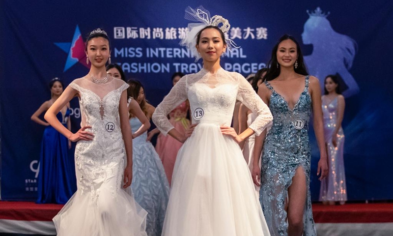Competitors participate in the final of 2021 Miss International Fashion Travel Pageant in Alameda of San Francisco Bay Area, the United States, Jan. 23, 2022.(Photo: Xinhua)