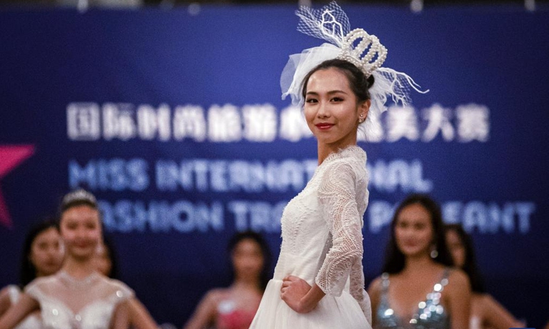 A competitor participates in the final of 2021 Miss International Fashion Travel Pageant in Alameda of San Francisco Bay Area, the United States, Jan. 23, 2022.(Photo: Xinhua)