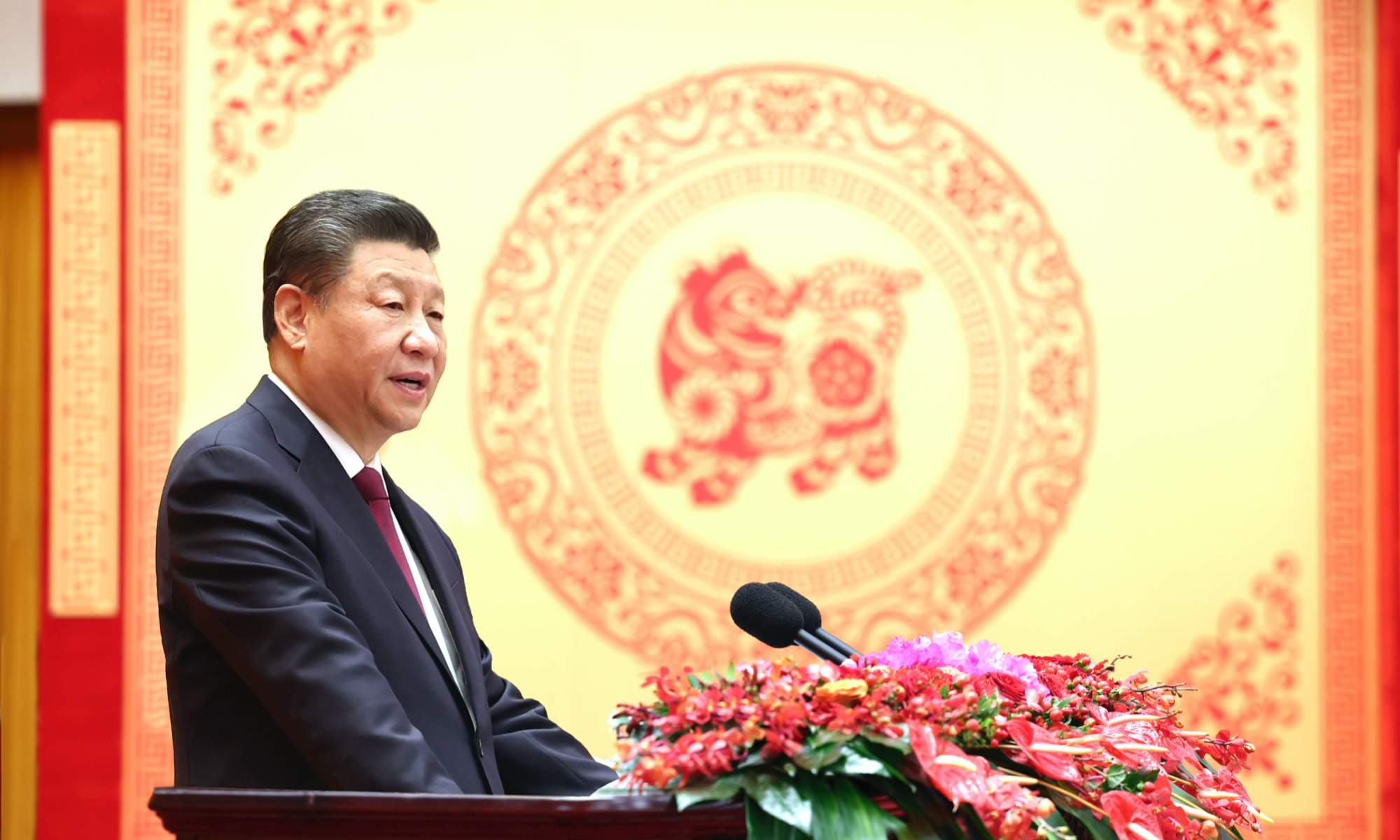 Chinese President Xi Jinping, also general secretary of the Communist Party of China (CPC) Central Committee and chairman of the Central Military Commission, addresses a Chinese Lunar New Year reception at the Great Hall of the People in Beijing, capital of China, Jan. 30, 2022. The CPC Central Committee and the State Council held the reception on Sunday in Beijing. (Xinhua/Ju Peng)