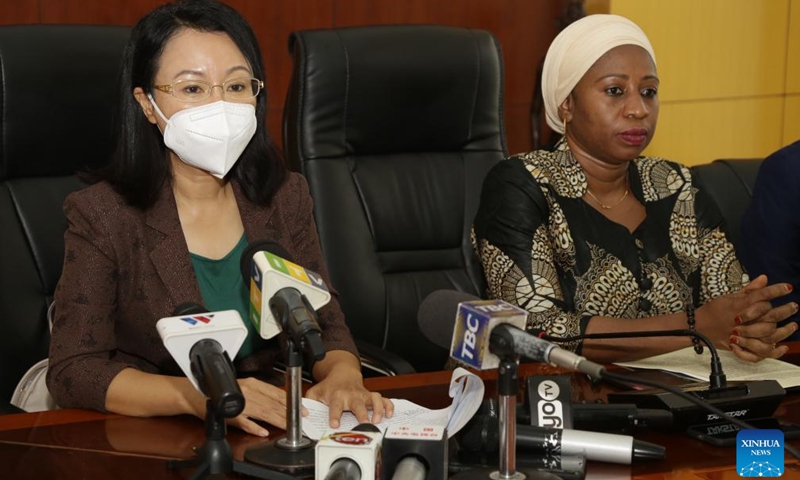 Chinese Ambassador to Tanzania Chen Mingjian (L) and Tanzanian Minister of Health, Community Development, Gender, Elderly and Children Ummy Mwalimu attend a handover ceremony of COVID-19 vaccines at the Julius Nyerere International Airport in Dar es Salaam, Tanzania, on Jan. 26, 2022.Photo:Xinhua