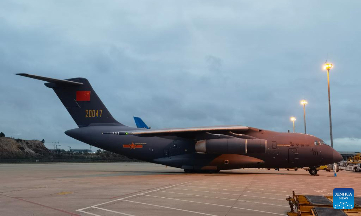 Photo taken with a mobile phone shows Chinese military aircraft returning to the Guangzhou Baiyun International Airport in Guangzhou, south China's Guangdong Province, on Jan. 29, 2022, after delivering relief supplies to Tonga. (Xinhua/Ding Zengyi)