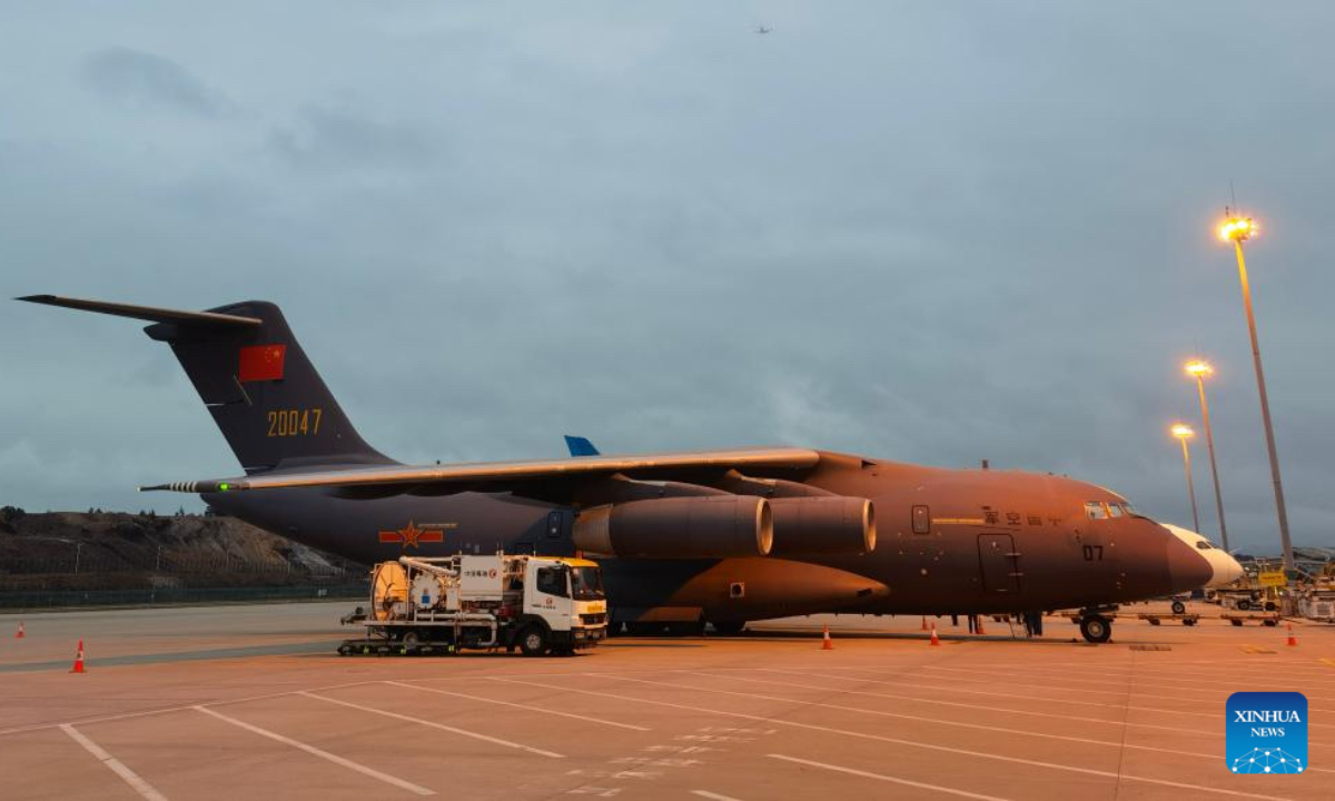 Photo taken with a mobile phone shows Chinese military aircraft returning to the Guangzhou Baiyun International Airport in Guangzhou, south China's Guangdong Province, on Jan. 29, 2022, after delivering relief supplies to Tonga. (Xinhua/Ding Zengyi)