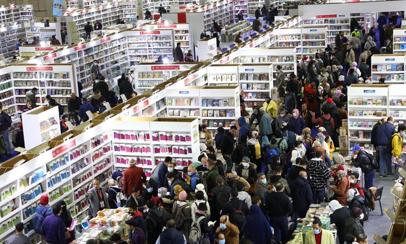 People visit the Cairo International Book Fair held in Cairo, Egypt, on Jan. 27, 2022.(Photo: Xinhua)